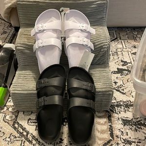 Two pairs of slide sandals